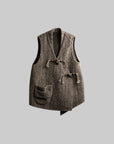 DOINDULGE Textured Wool Vest with Asymmetric Panels and Hand-Tied Toggle Details
