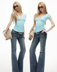 IAMXIAA Low-Rise Eyelet Pocket Distressed Flared Denim Jeans with Vintage Wash