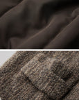 DOINDULGE Textured Wool Vest with Asymmetric Panels and Hand-Tied Toggle Details