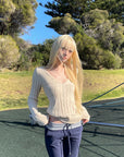 Rase le sol Sculpted V-Neck Cable Knit Top