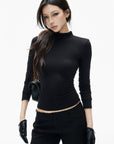 IAMXIAA Open-Back Mock Neck Long Sleeve Top