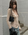 Rase le sol Lace-Trimmed Deep V-Neck Fitted Long Sleeve Top
