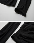 DOINDULGE Irregular Neckline Knit Long Sleeve Top