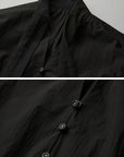 DOINDULGE Sculptural Ribbon Sleeve High Neck Shirt