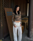 Hydrae Leopard Print Long Sleeve Top With Fitted Silhouette And Lace Trim Details