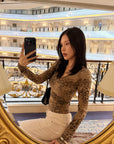 Hydrae Leopard Print Long Sleeve Top With Fitted Silhouette And Lace Trim Details