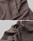 DOINDULGE Asymmetric Long Sleeve Top with Draped Hem