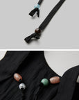 DOINDULGE Sleeveless Draped Maxi Dress with Hand-Tied Bead Embellishment and Sculpted Waist