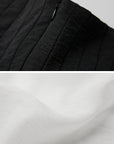 DOINDULGE Fringe Paneled Layered Skirt with Pleats and Contrast Hem