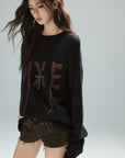 Low pixel Distressed Letter Embroidered Oversized Knit Sweater
