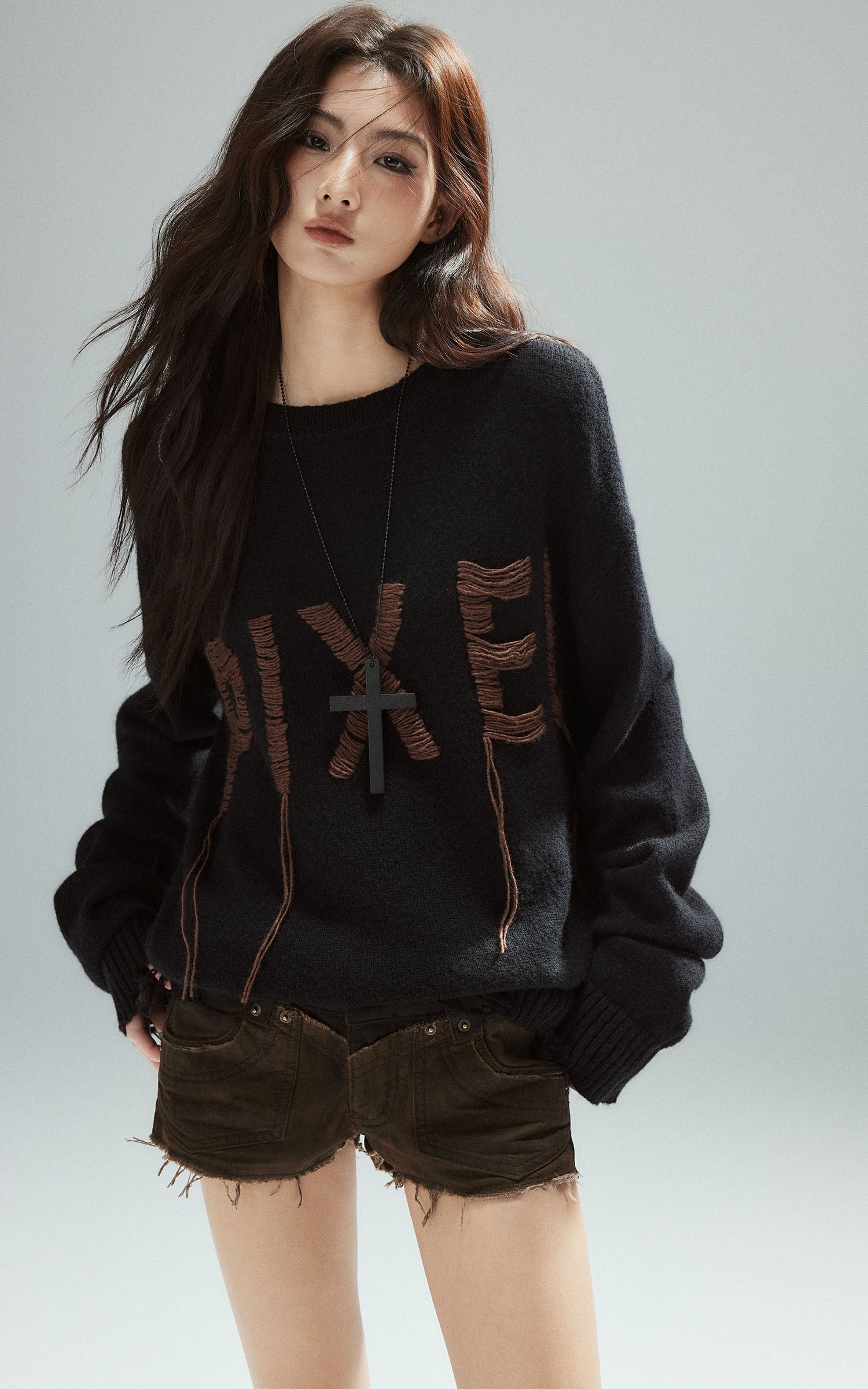 Low pixel Distressed Letter Embroidered Oversized Knit Sweater