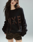 Low pixel Distressed Letter Embroidered Oversized Knit Sweater