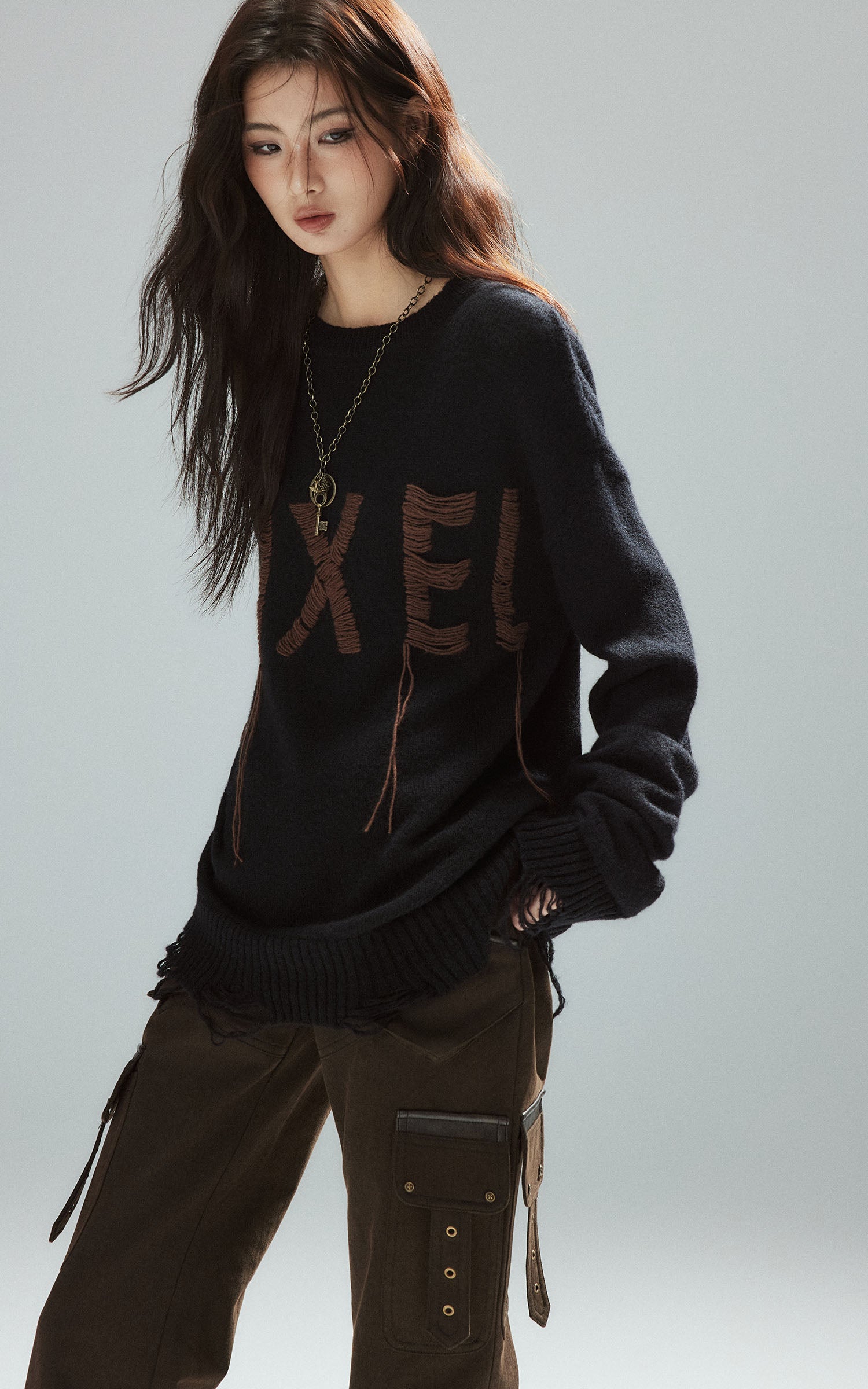 Low pixel Distressed Letter Embroidered Oversized Knit Sweater