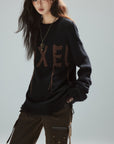 Low pixel Distressed Letter Embroidered Oversized Knit Sweater