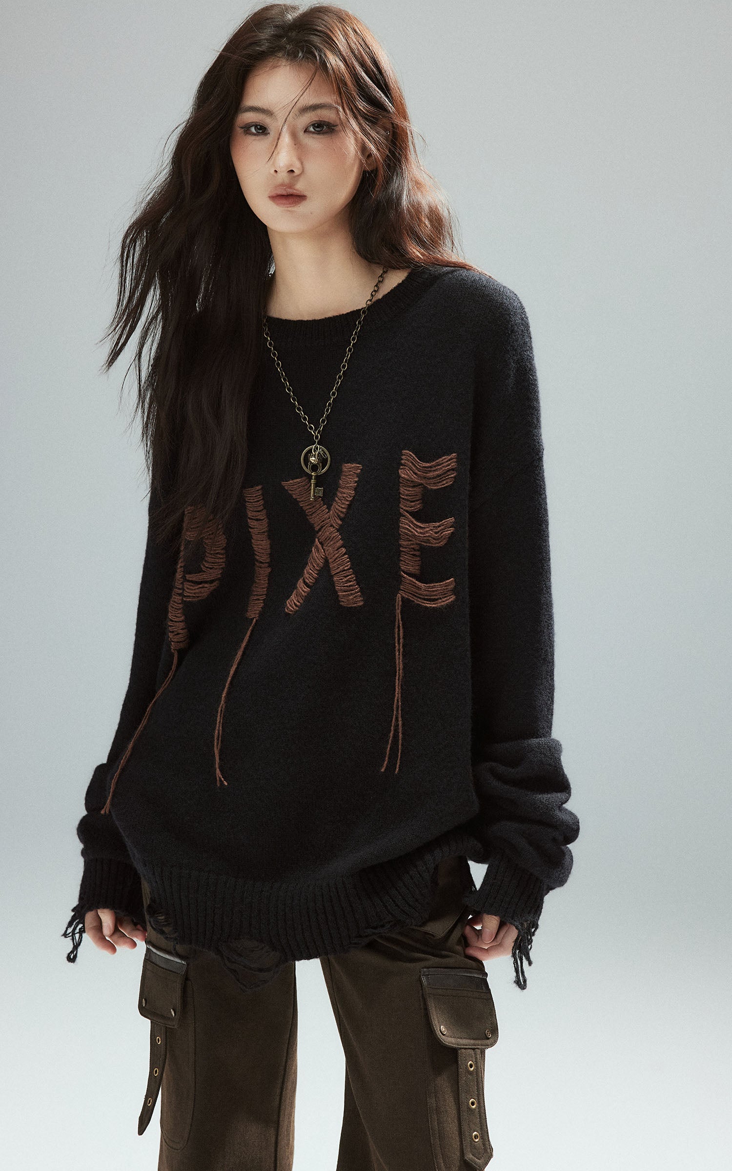 Low pixel Distressed Letter Embroidered Oversized Knit Sweater