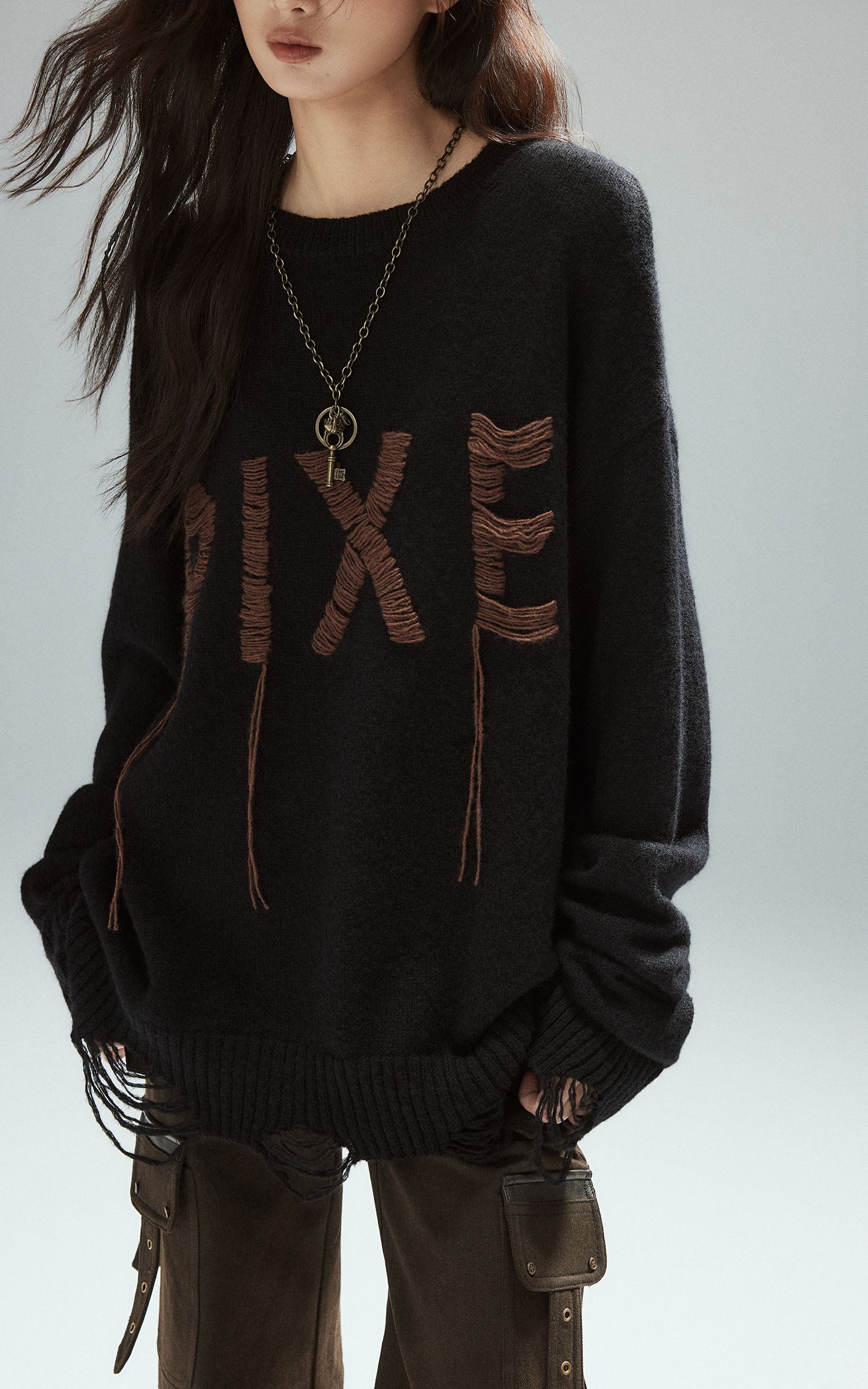 Low pixel Distressed Letter Embroidered Oversized Knit Sweater