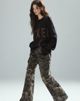 Low pixel Distressed Letter Embroidered Oversized Knit Sweater