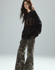 Low pixel Distressed Letter Embroidered Oversized Knit Sweater