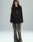 Low pixel Distressed Letter Embroidered Oversized Knit Sweater