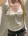 Rase le sol Twisted V-Neck Fitted Long Sleeve Top