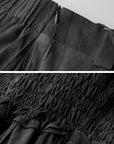 DOINDULGE Asymmetric Smocked Maxi Skirt