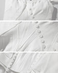 WARDEN EDGE Asymmetric Ruffled Mini Dress with Corset Detailing and Off-Shoulder Straps