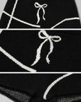 Rase le sol Black Knit Set with Cross Butterfly Motif