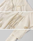 Rase le sol Ivory Ruffled Tie-Front Asymmetric Blouse