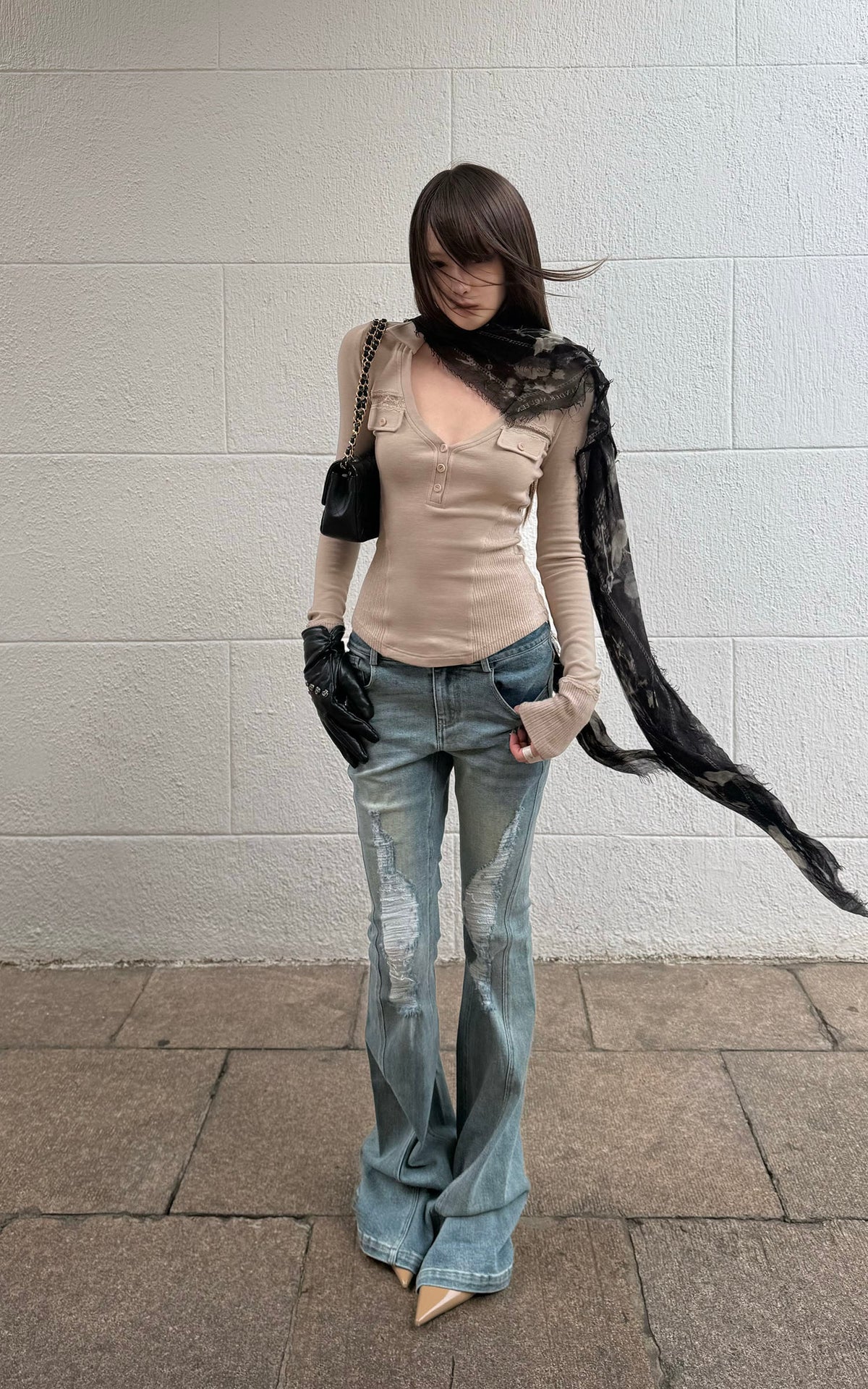 Rase le sol Distressed Low-Rise Flared Denim Pants