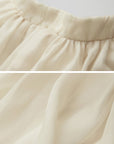 DOINDULGE Ethereal Draped Halter Dress with Voluminous Silk Layers