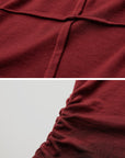 DOINDULGE Asymmetric Draped Long Sleeve Top with Ombre Dye and Stud Detail