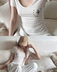 Rase le sol Star Emblem Ruched Scoop Neck Top
