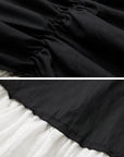 DOINDULGE Layered Contrast Hem Skirt with Gathered Draping and Buttoned High Waist