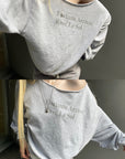 Rase le sol Fortune Arrives Raw Edge Off-Shoulder Oversized Long Sleeve Sweatshirt
