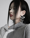 DOINDULGE Draped Twist Knit Top with High Neck and Long Sleeves