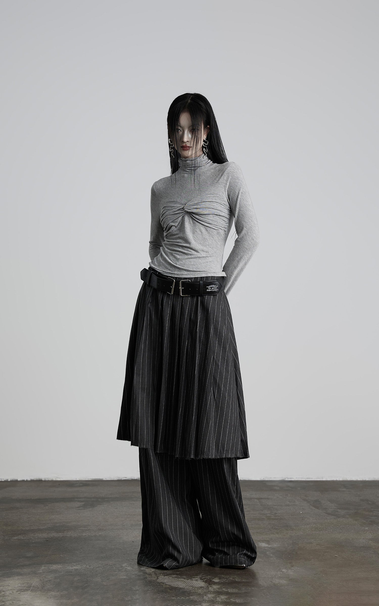 DOINDULGE Draped Twist Knit Top with High Neck and Long Sleeves