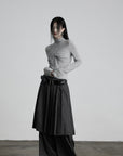 DOINDULGE Draped Twist Knit Top with High Neck and Long Sleeves