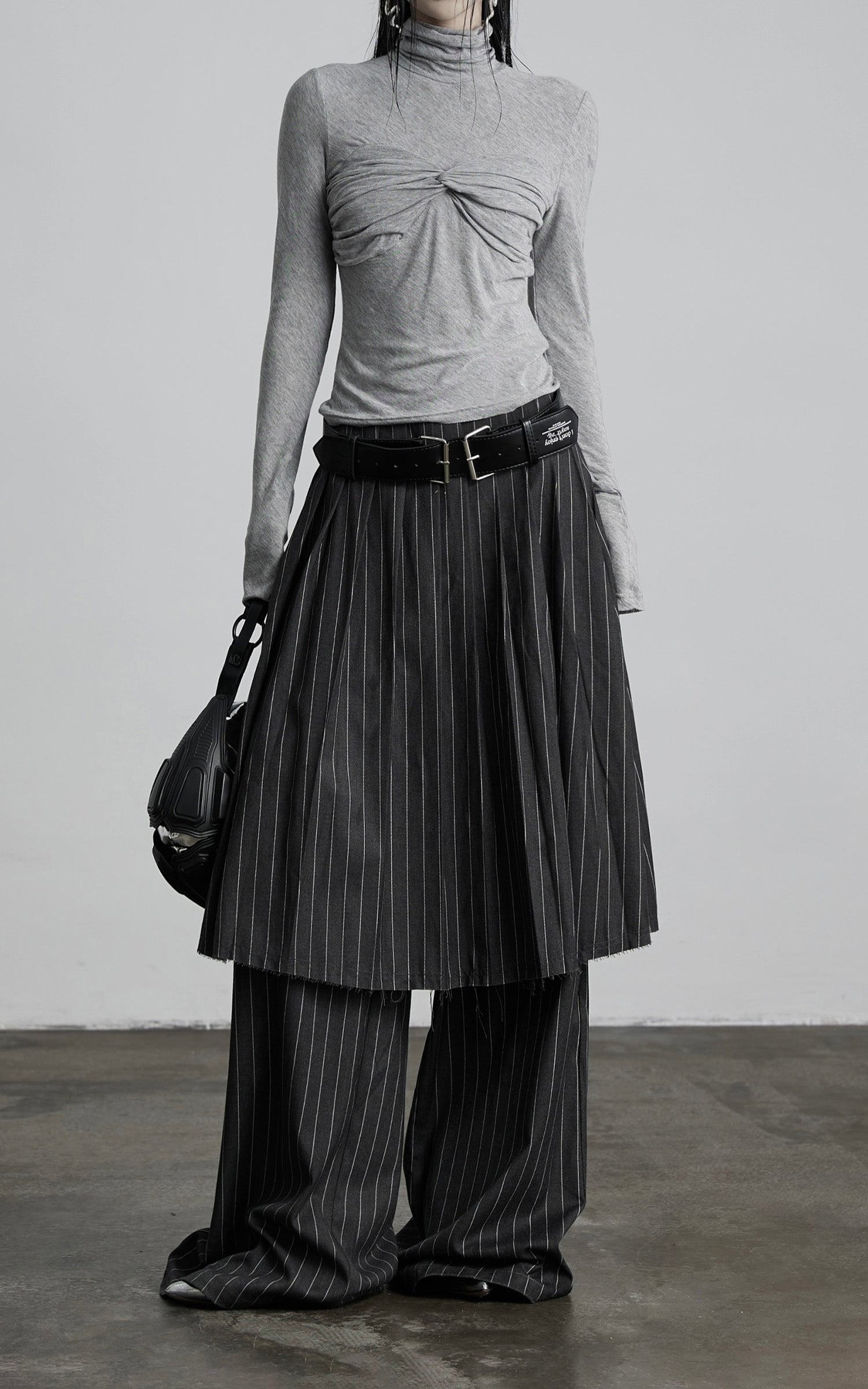 DOINDULGE Draped Twist Knit Top with High Neck and Long Sleeves
