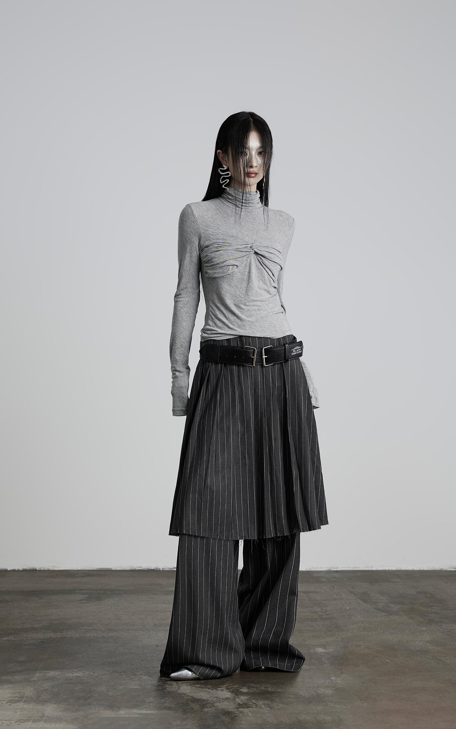 DOINDULGE Draped Twist Knit Top with High Neck and Long Sleeves