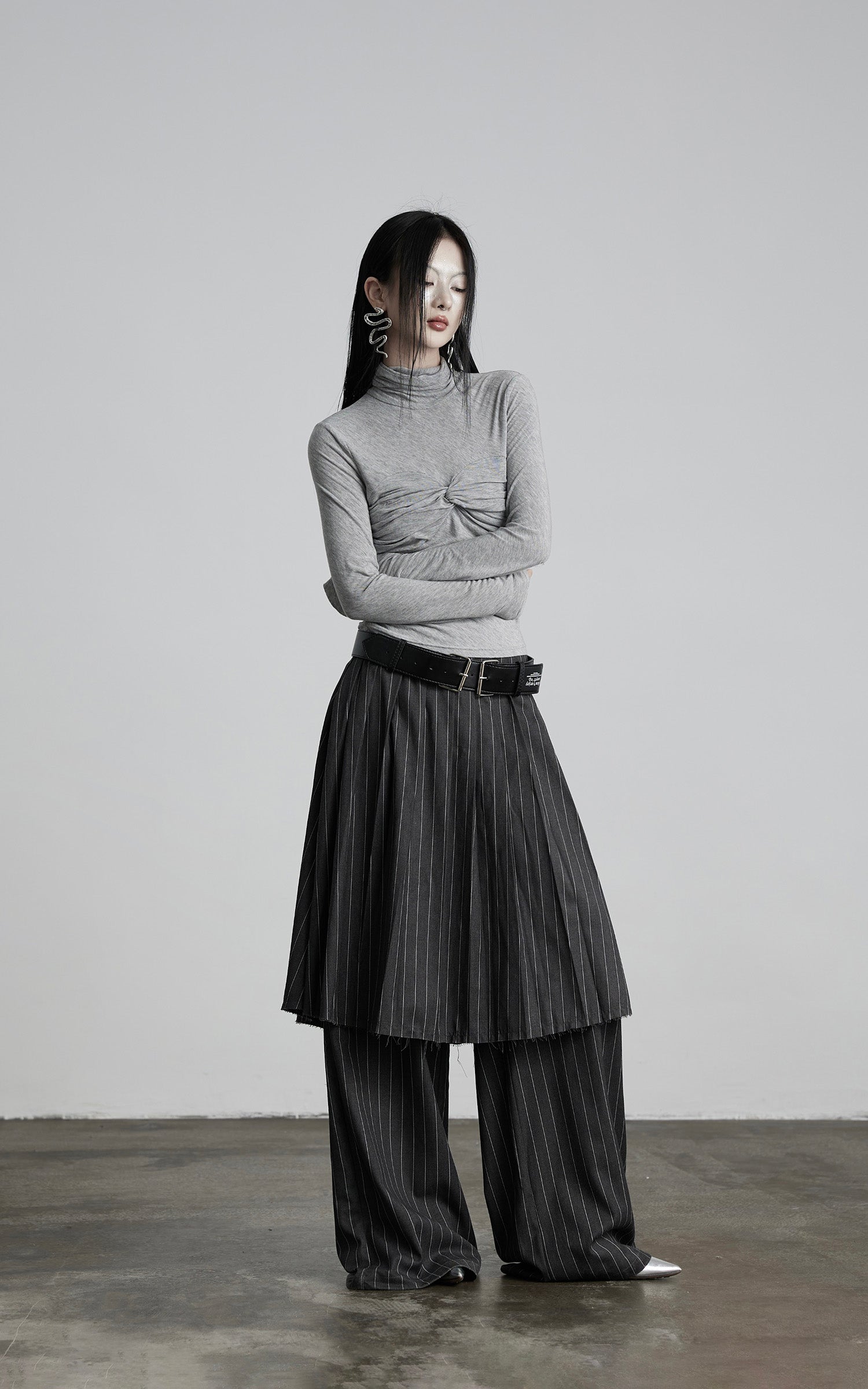 DOINDULGE Draped Twist Knit Top with High Neck and Long Sleeves