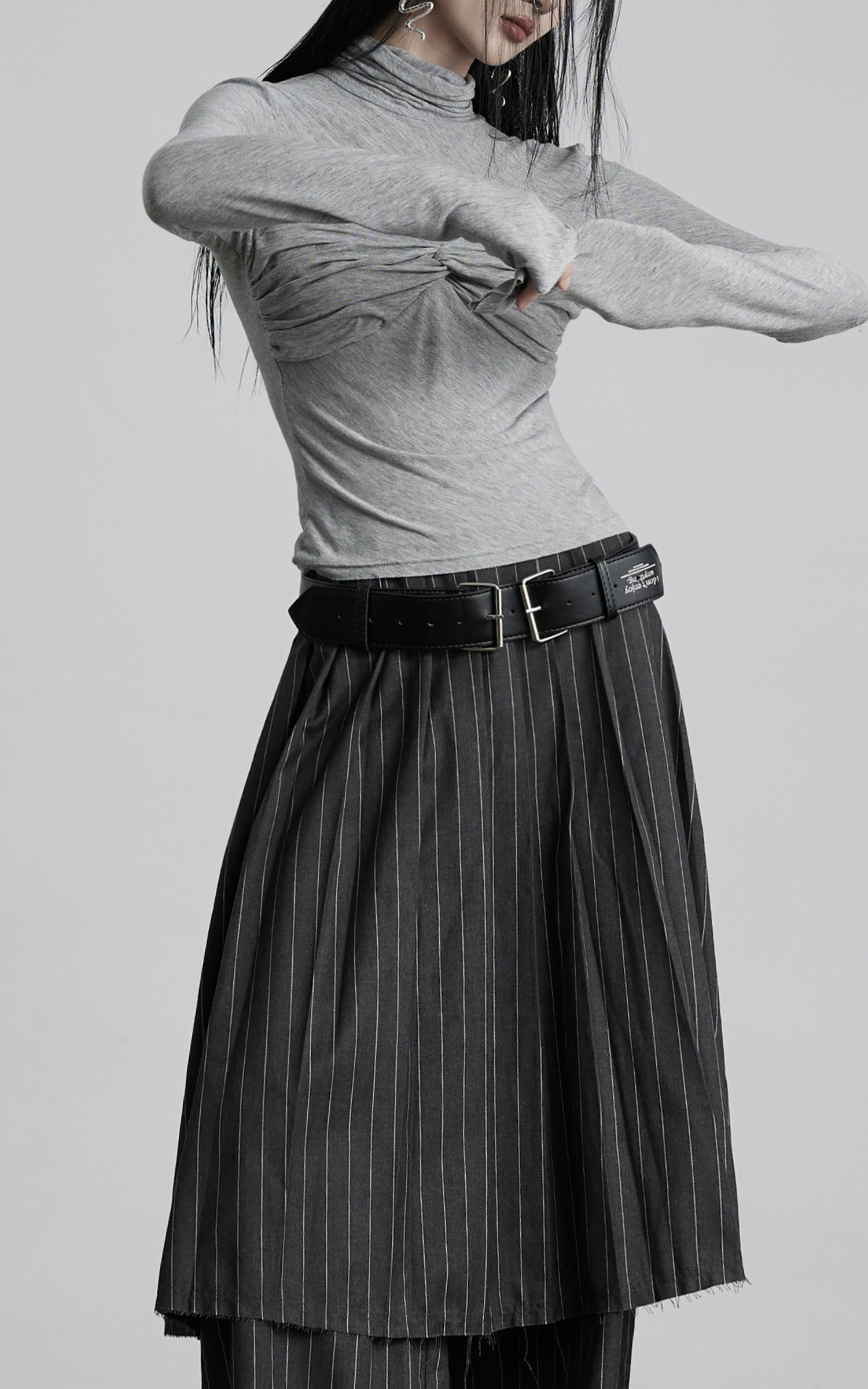 DOINDULGE Draped Twist Knit Top with High Neck and Long Sleeves