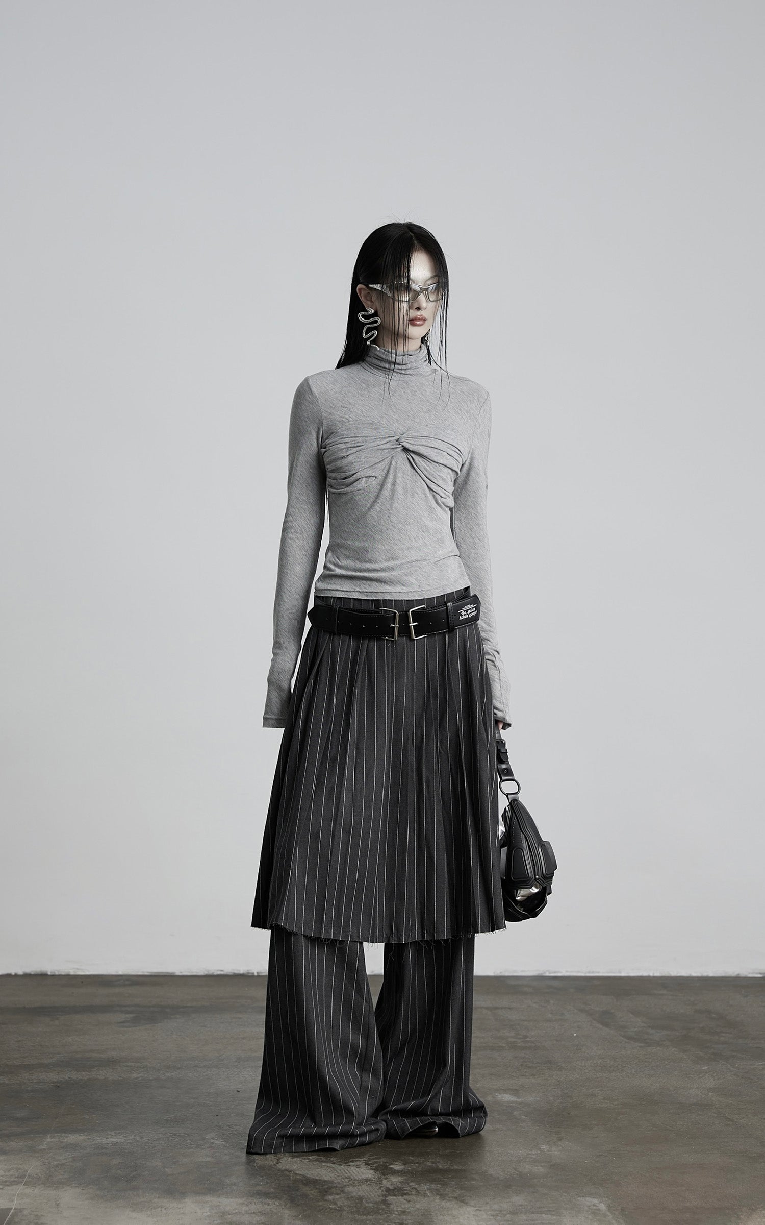 DOINDULGE Draped Twist Knit Top with High Neck and Long Sleeves