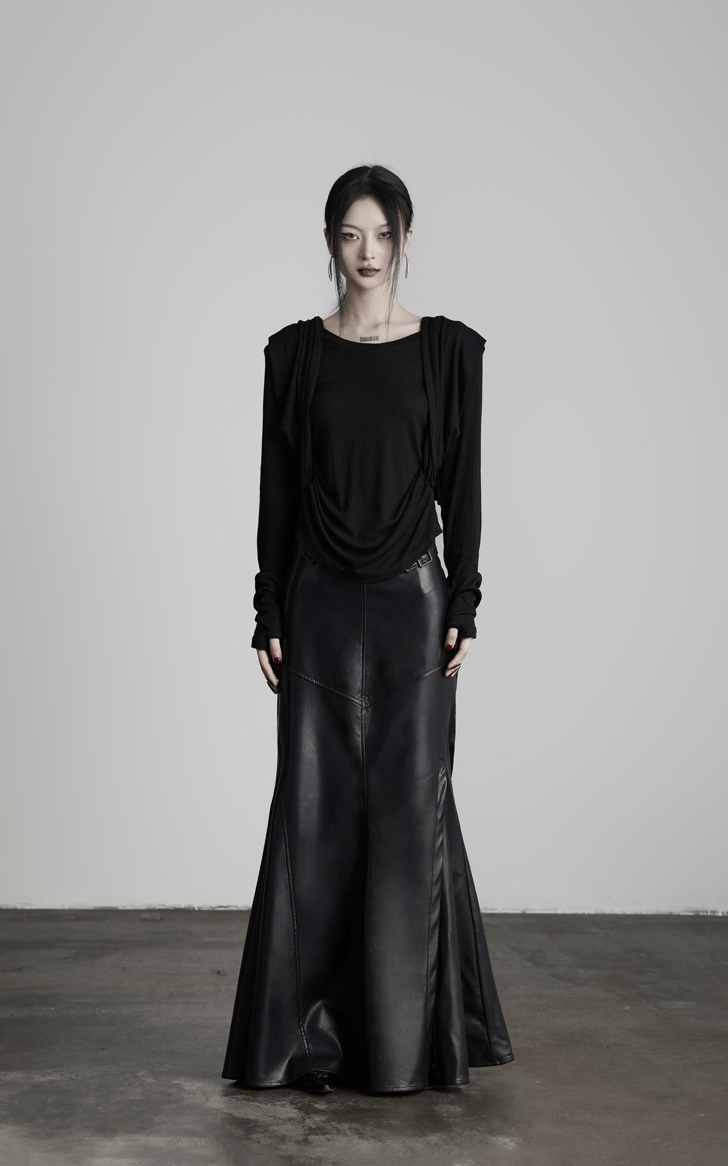 DOINDULGE Paneled Faux Leather Maxi Skirt with Stud Detail