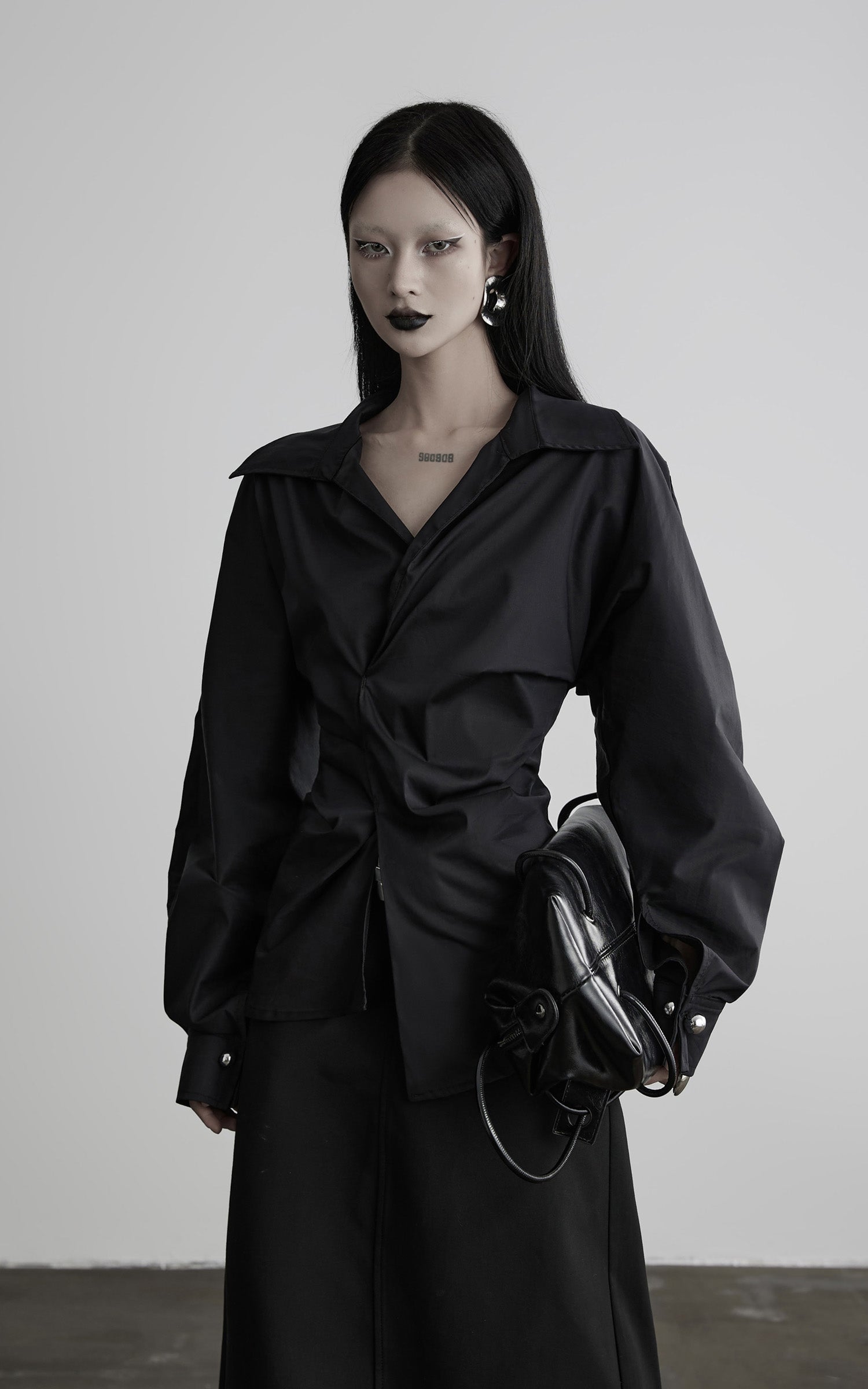 DOINDULGE Asymmetric Twisted Shirt with Sculptural Silhouette