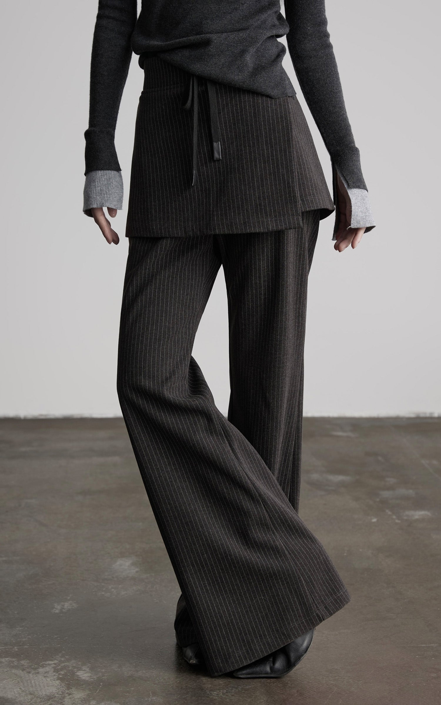 DOINDULGE Pinstripe Wide-Leg Pants with Apron Overlay and Drawstring Waist