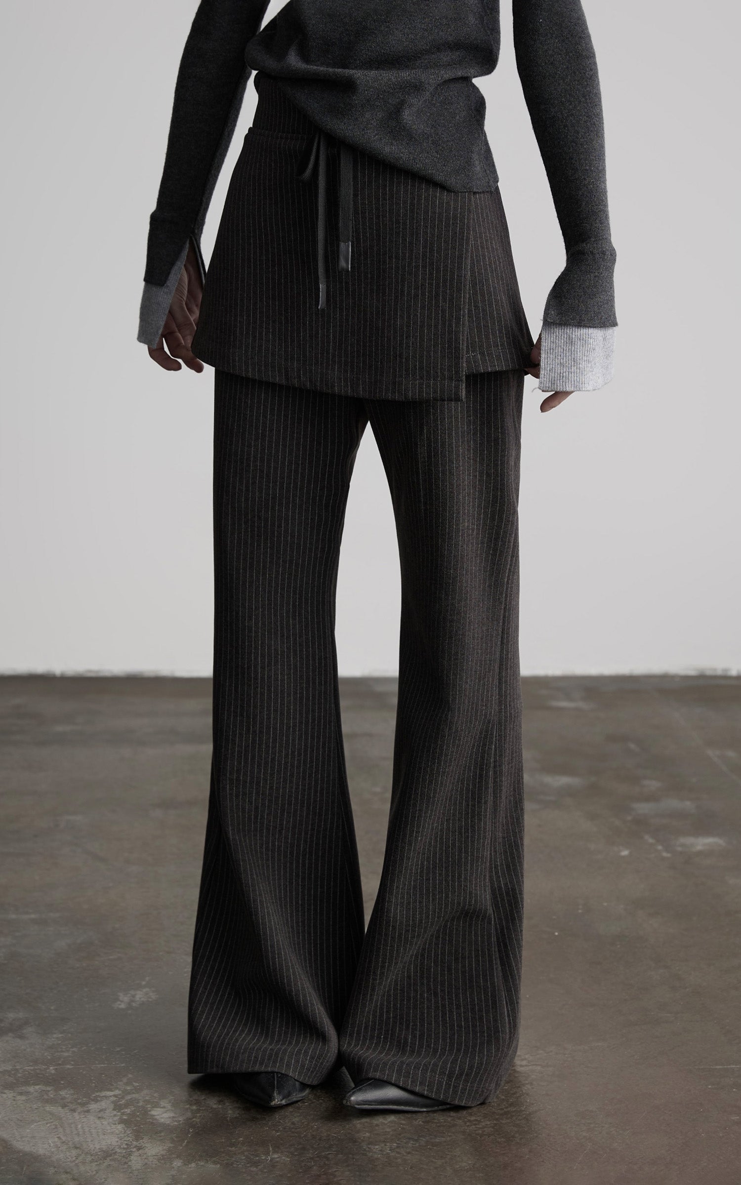 DOINDULGE Pinstripe Wide-Leg Pants with Apron Overlay and Drawstring Waist