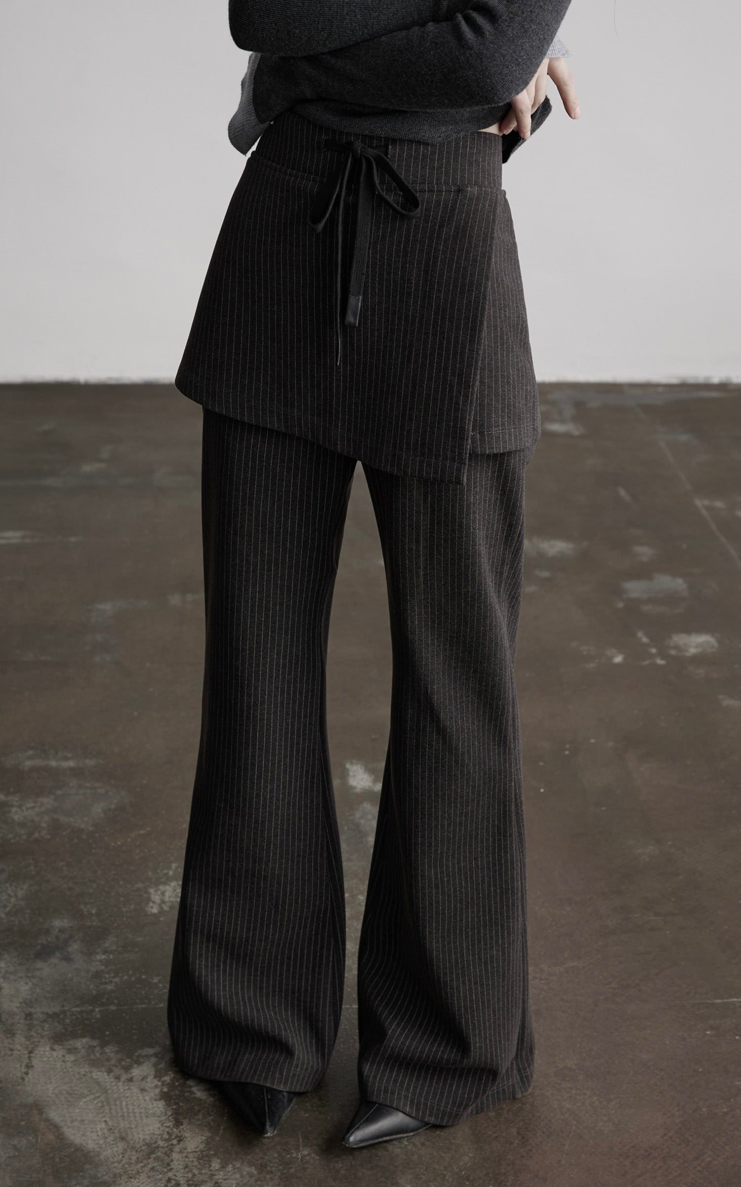 DOINDULGE Pinstripe Wide-Leg Pants with Apron Overlay and Drawstring Waist