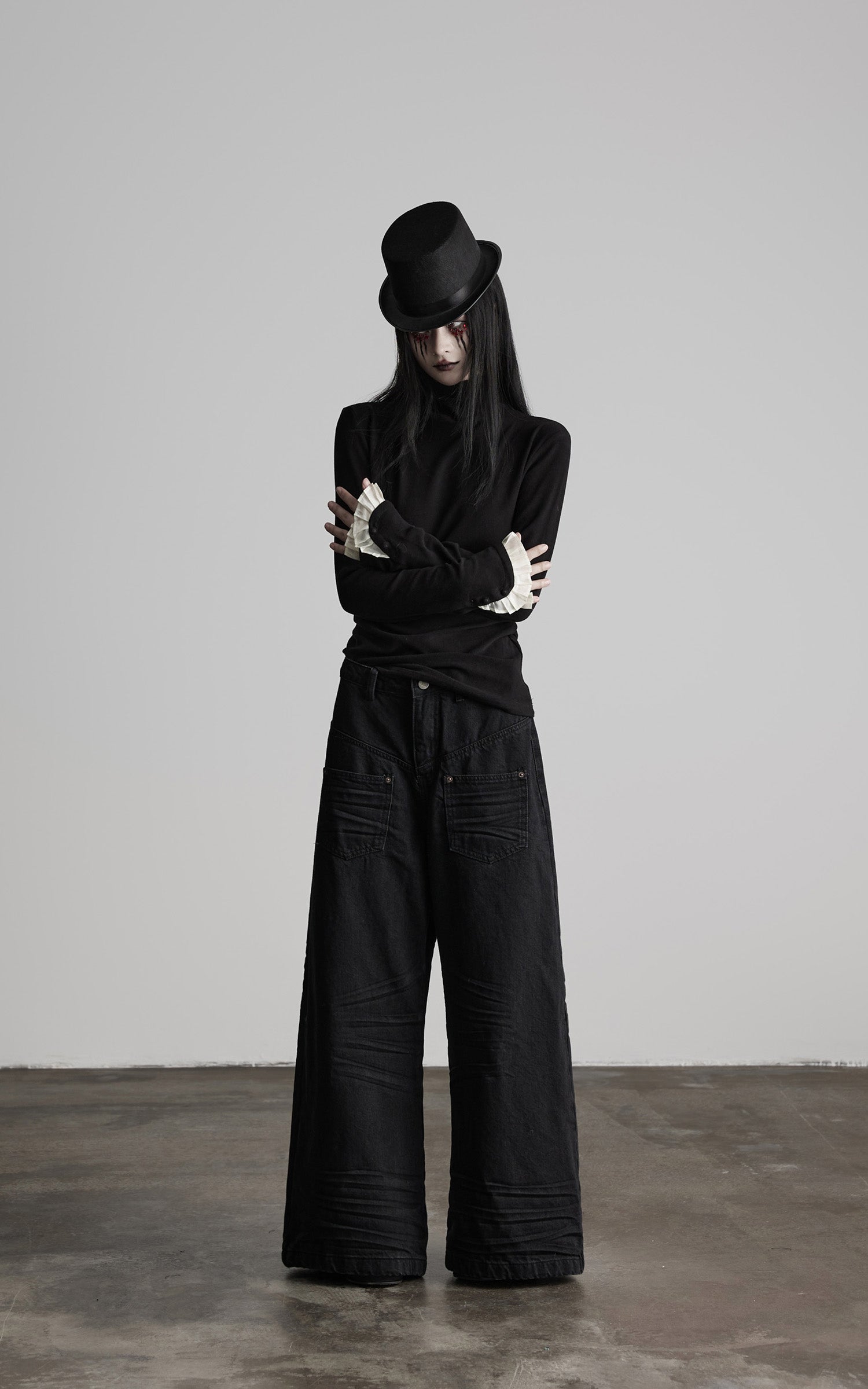 DOINDULGE Structured Knit Top with Contrast Pleated Cuffs