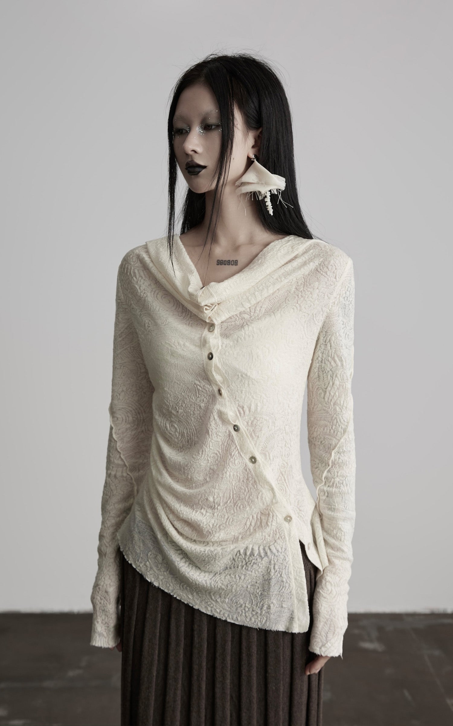 DOINDULGE Textured Knit Asymmetric Buttoned Long Sleeve Top