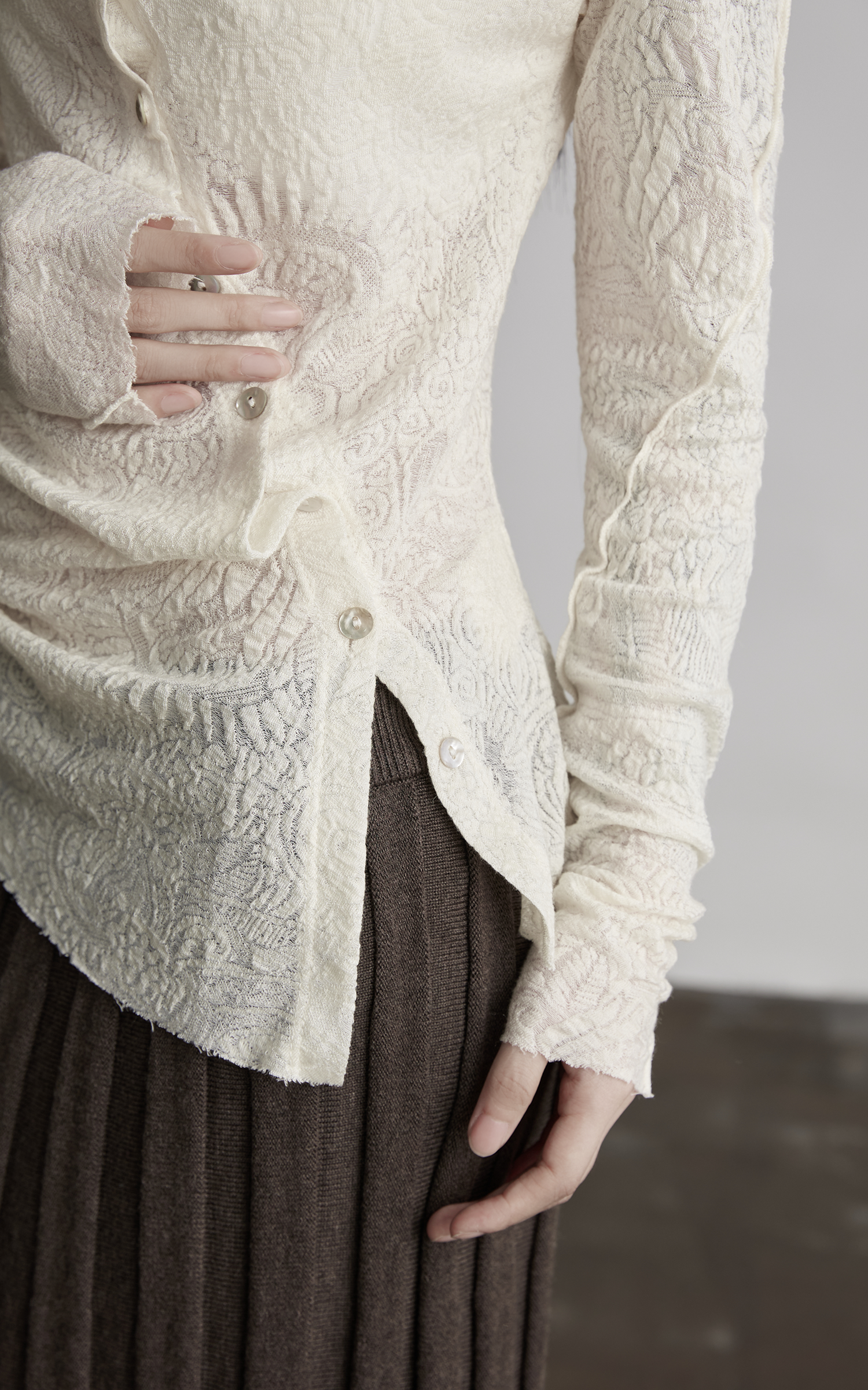 DOINDULGE Textured Knit Asymmetric Buttoned Long Sleeve Top